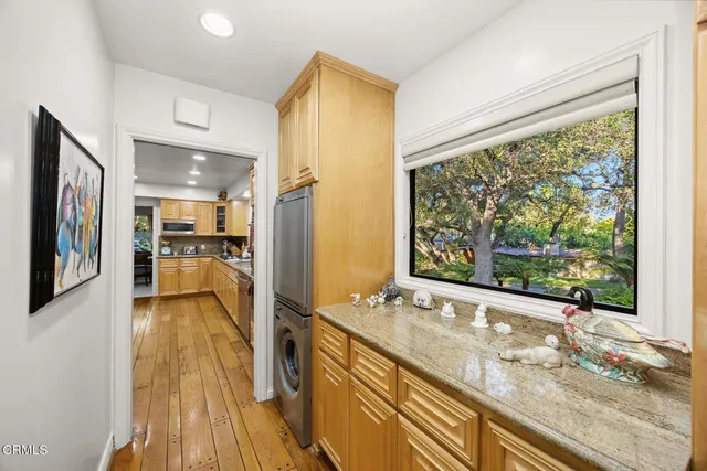 a view of house with outdoor space and trees