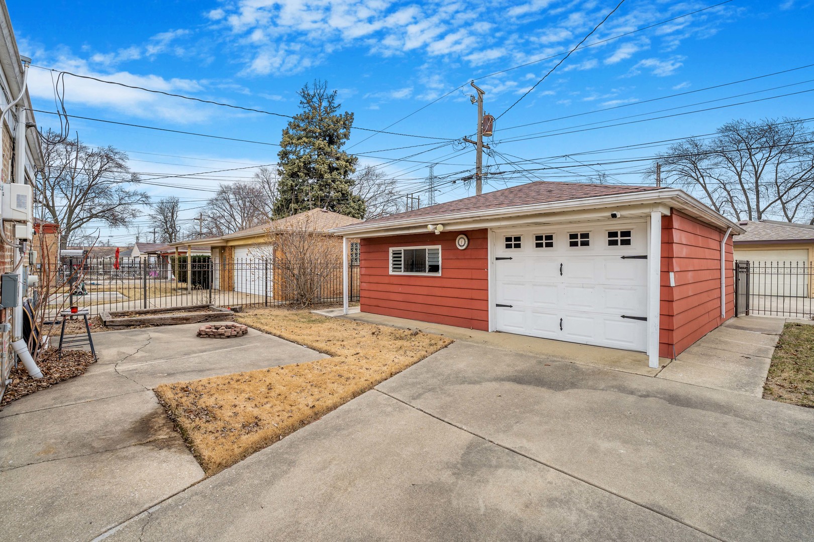 129 Rice Avenue Bellwood, IL 60104 - Photo 20 of 23 a view of a house with a snow in the yard