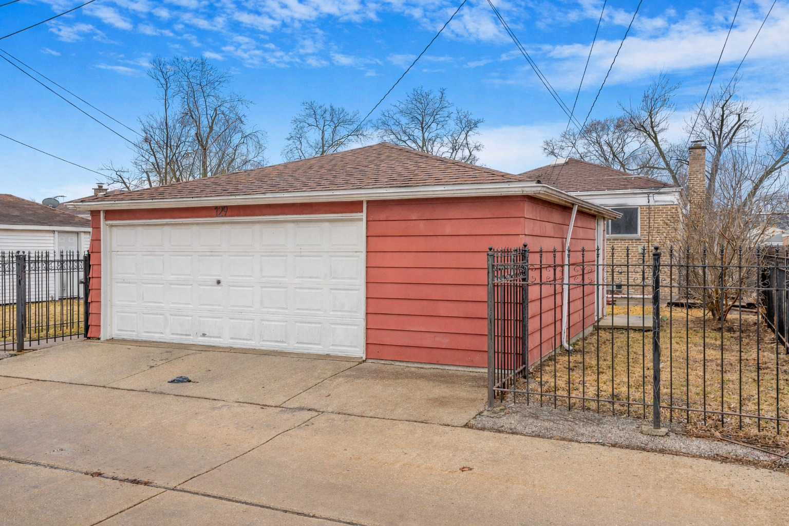 129 Rice Avenue Bellwood, IL 60104 - Photo 23 of 23 a view of a house with a garage