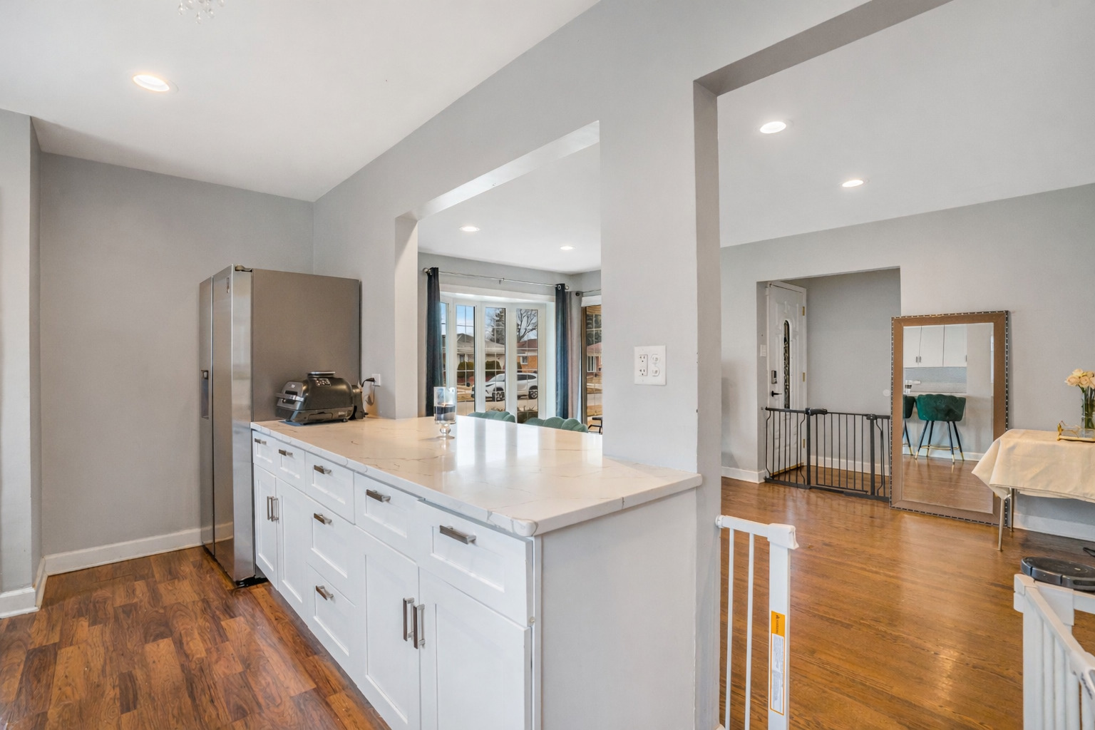 129 Rice Avenue Bellwood, IL 60104 - Photo 5 of 23 a kitchen with counter top space and wooden floor