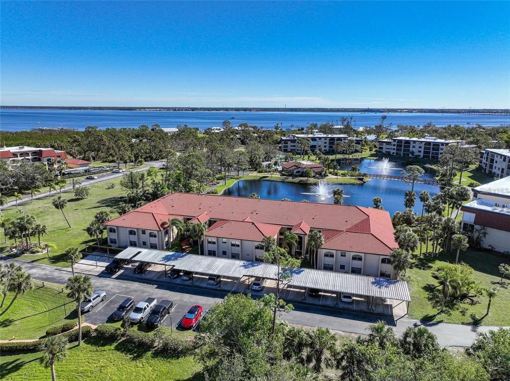 an aerial view of a houses with a swimming pool