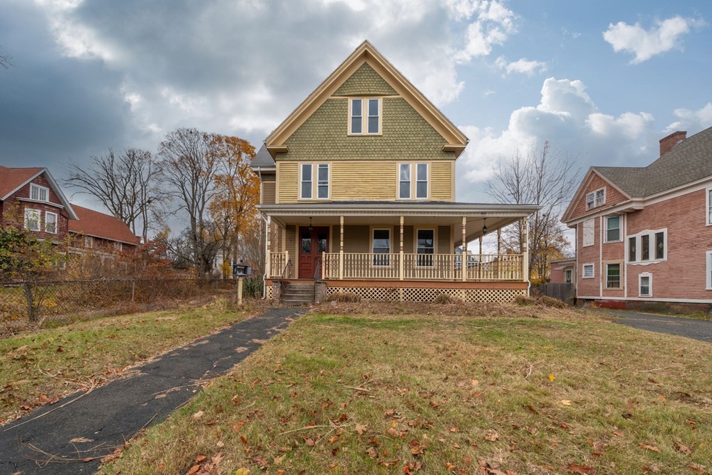 151 Lincoln Street Holyoke, MA 01040 - Photo 2 of 40 a front view of a house with a yard