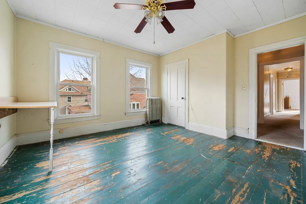 151 Lincoln Street Holyoke, MA 01040 - Photo 25 of 40 a view of livingroom with hardwood floor and ceiling fan