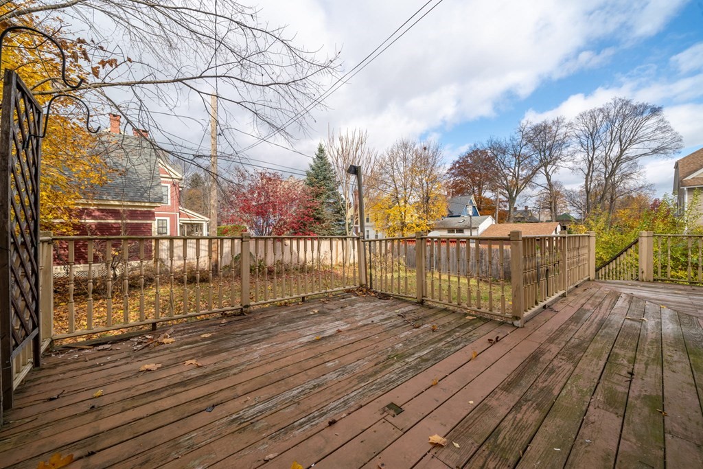 151 Lincoln Street Holyoke, MA 01040 - Photo 32 of 40 a view of wooden deck with trees