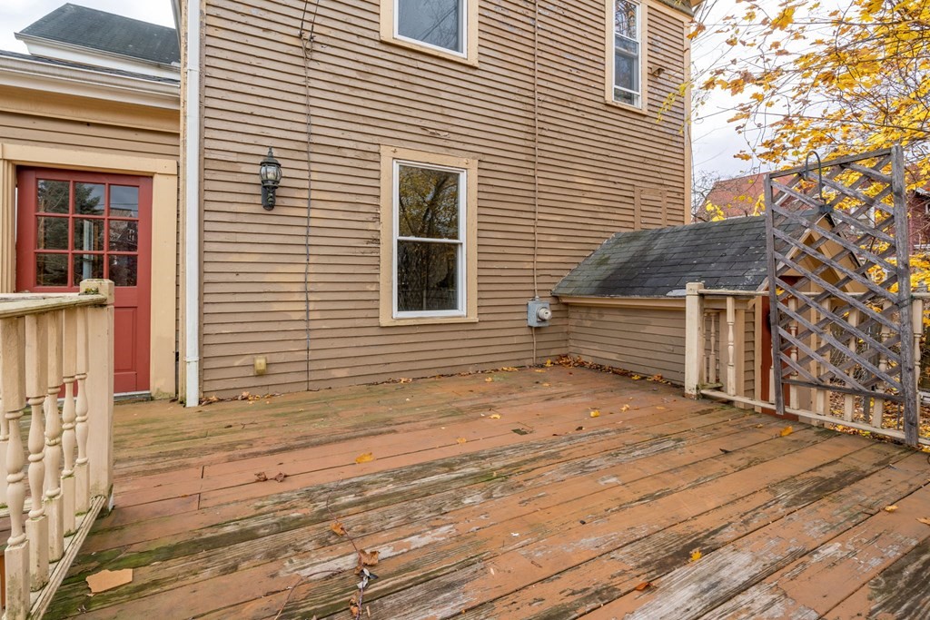 151 Lincoln Street Holyoke, MA 01040 - Photo 33 of 40 a backyard of a house with wooden floor