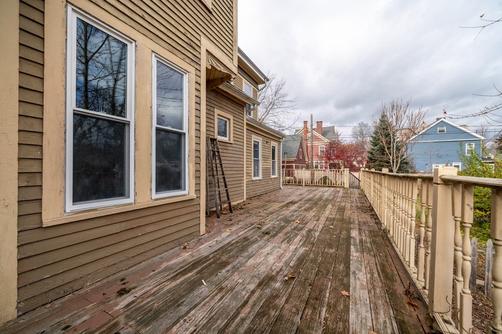 151 Lincoln Street Holyoke, MA 01040 - Photo 35 of 40 a view of a brick house with many windows