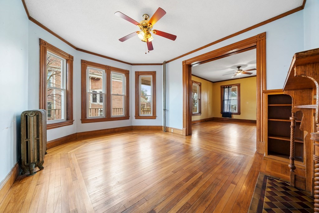 151 Lincoln Street Holyoke, MA 01040 - Photo 6 of 40 a view of a livingroom with furniture wooden floor and window