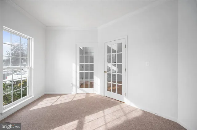 a kitchen with stainless steel appliances granite countertop a sink a stove cabinets and a counter top space