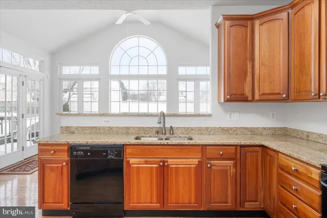 a view of a kitchen with furniture and a kitchen