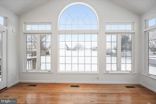 a bathroom with a sink a mirror and a toilet