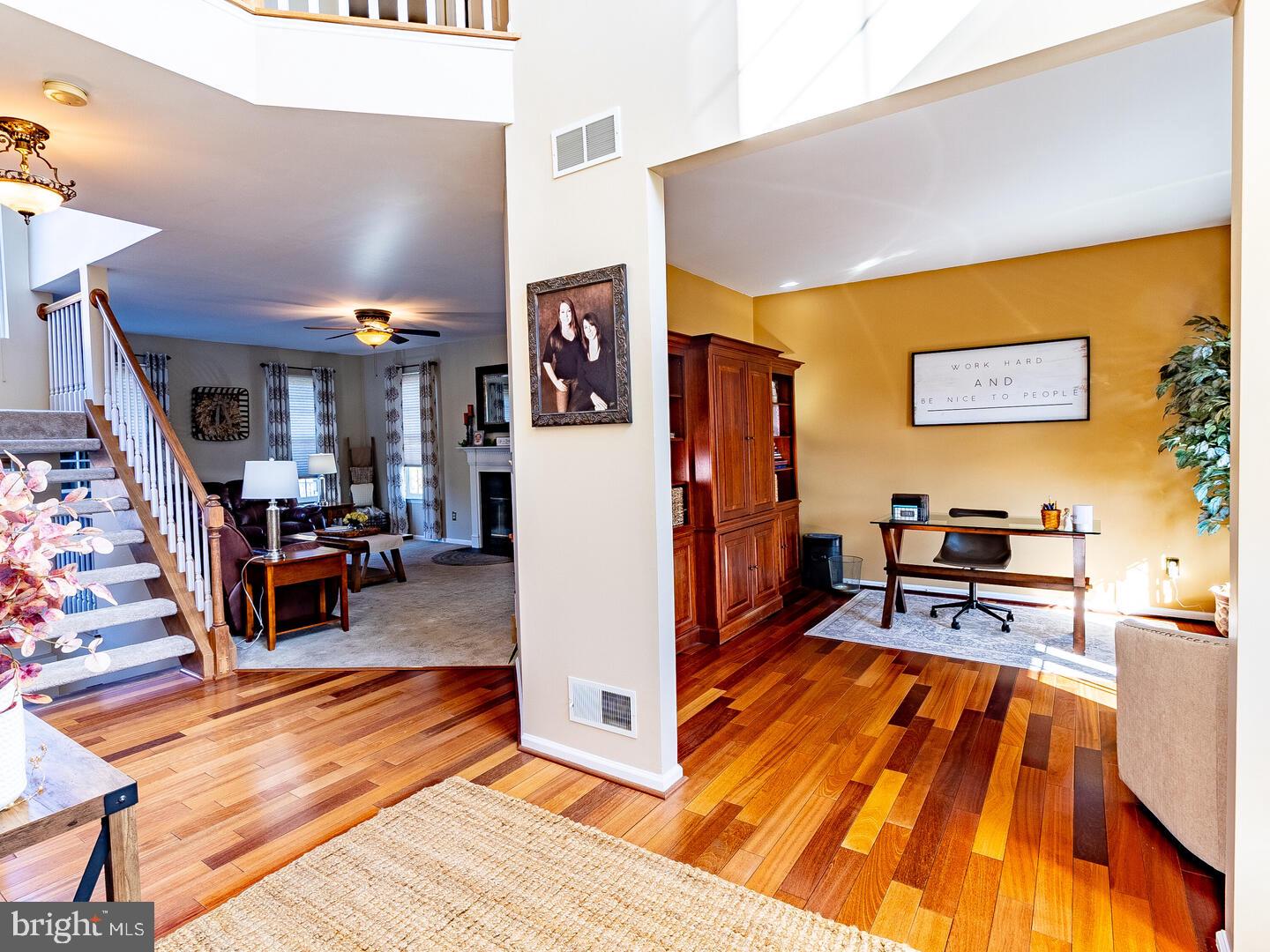 63 Emerald Ridge Drive Bear, DE 19701 - Photo 20 of 78 a living room with furniture and kitchen view