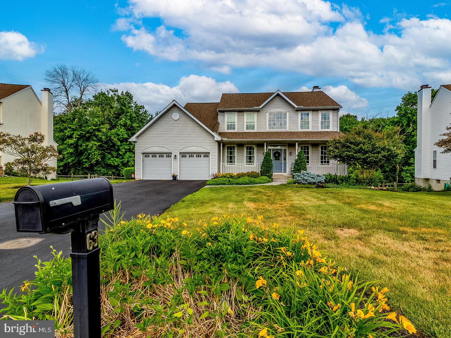 63 Emerald Ridge Drive Bear, DE 19701 - Photo 2 of 78 a front view of a house with garden
