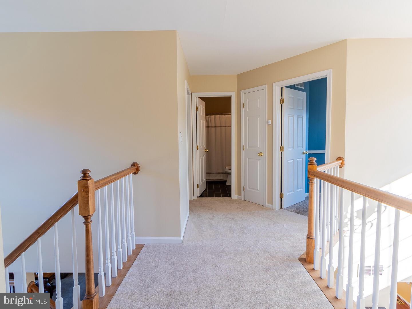 63 Emerald Ridge Drive Bear, DE 19701 - Photo 41 of 78 a view of a hallway with wooden floor and entryway