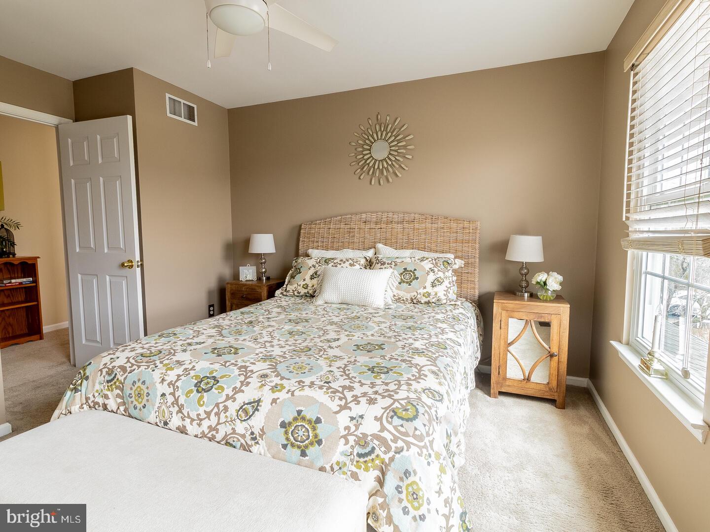 63 Emerald Ridge Drive Bear, DE 19701 - Photo 45 of 78 a bedroom with a bed and a tv on the dresser