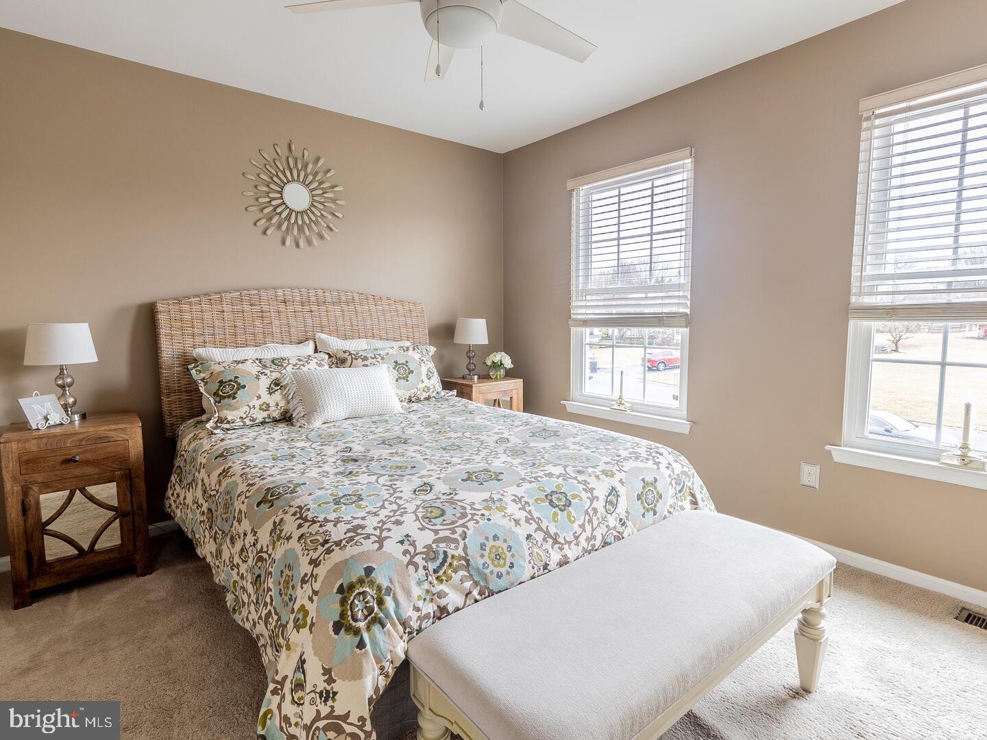 63 Emerald Ridge Drive Bear, DE 19701 - Photo 47 of 78 a large bed sitting in a bedroom next to a window