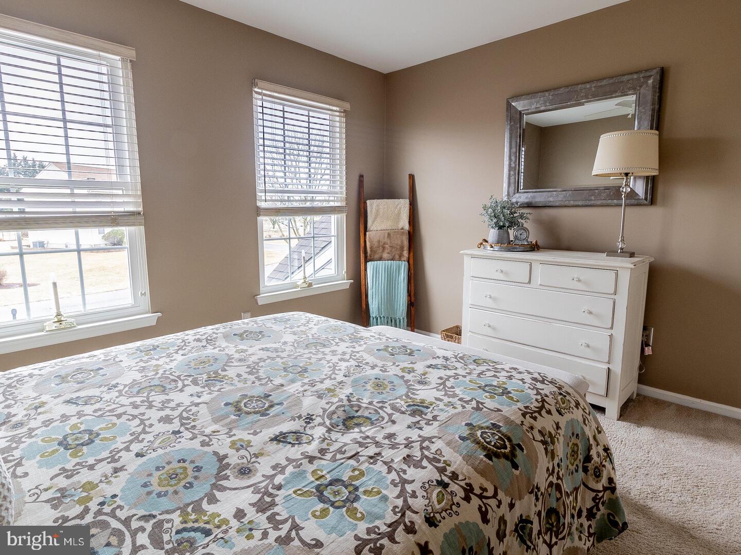 63 Emerald Ridge Drive Bear, DE 19701 - Photo 48 of 78 a bedroom with a bed and a dresser next to a window