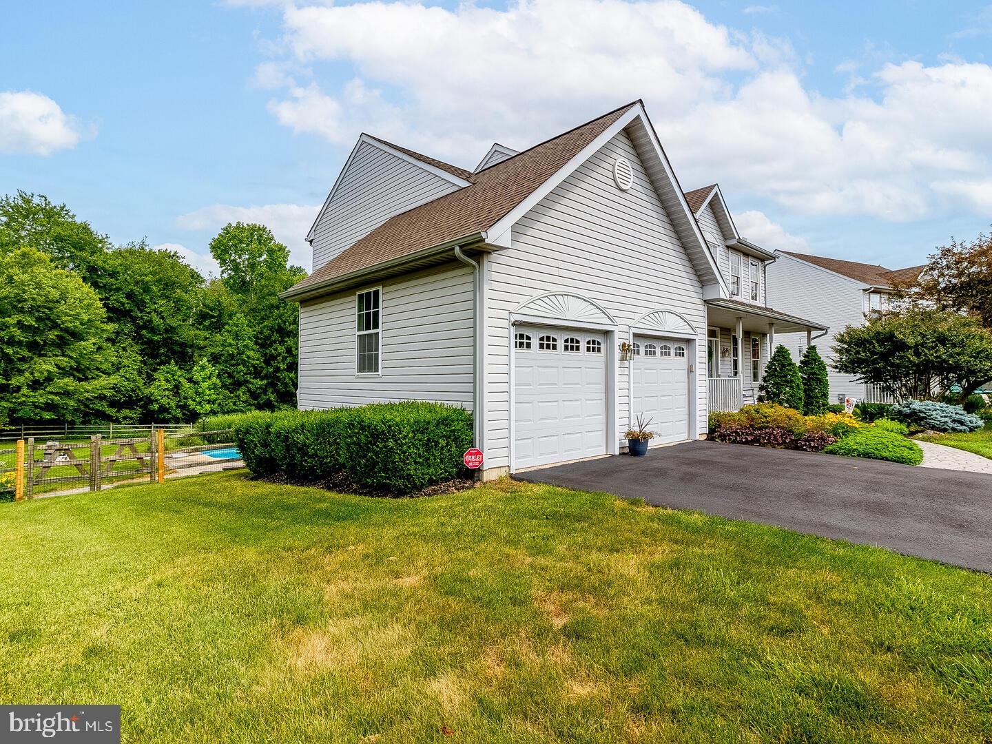 63 Emerald Ridge Drive Bear, DE 19701 - Photo 76 of 78 a view of a house with a yard and garage