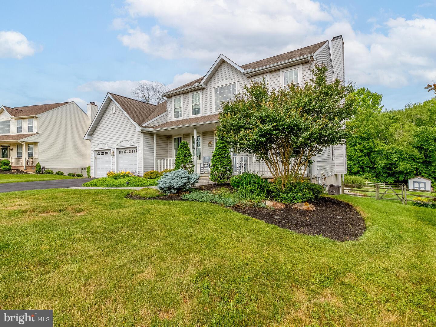 63 Emerald Ridge Drive Bear, DE 19701 - Photo 78 of 78 a front view of a house with garden