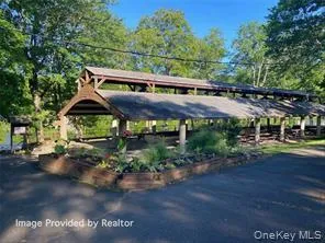 a view of a field with an ocean
