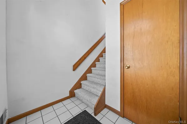 a view of kitchen with furniture and a ceiling fan