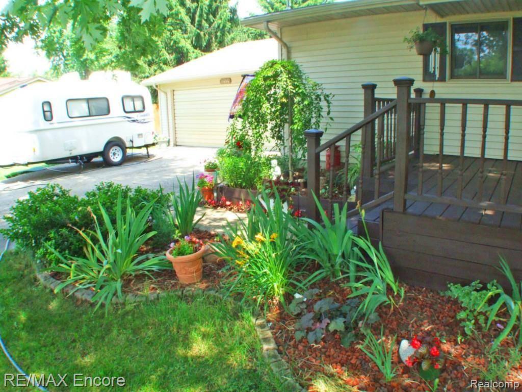 8456 Clarridge Road Clarkston, MI 48348 - Photo 21 of 22 clairidge front garden.jpg