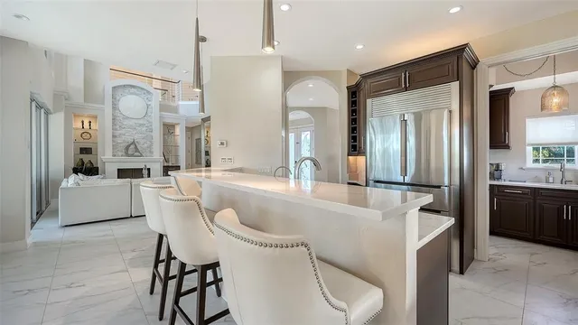 a kitchen with a table and chairs