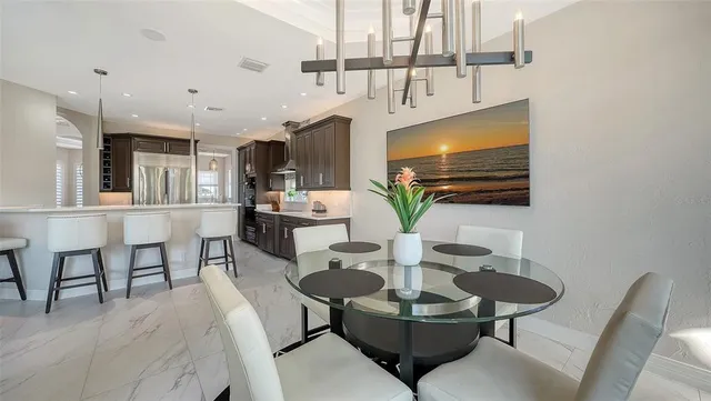 a view of a livingroom with furniture and window