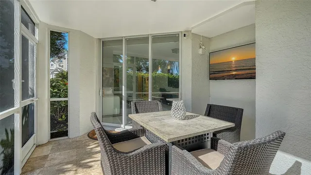 a spacious bedroom with a bed and a chandelier