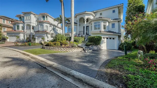 a front view of a building with garden