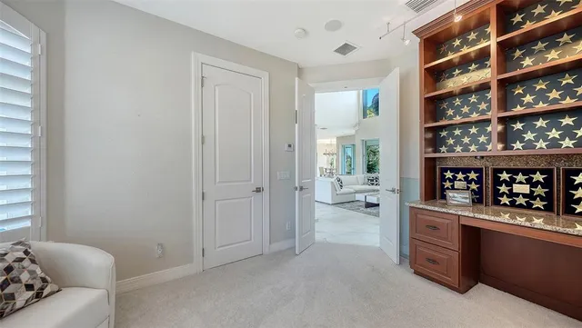 a small swimming pool with outdoor seating yard and barbeque oven