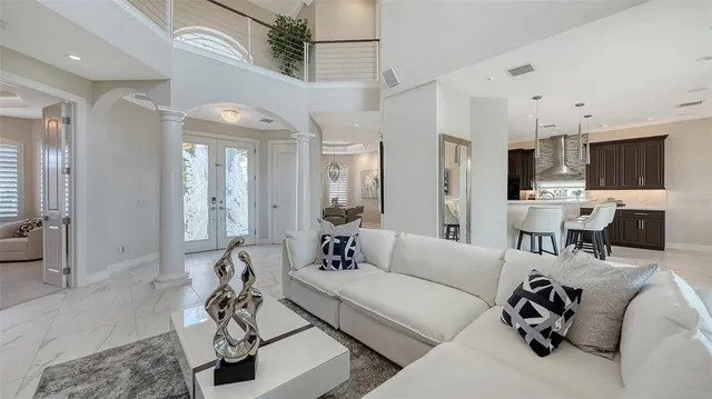 a view of a living room and dining room