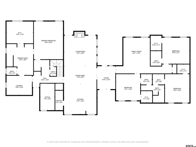 an entryway with wooden floor and windows