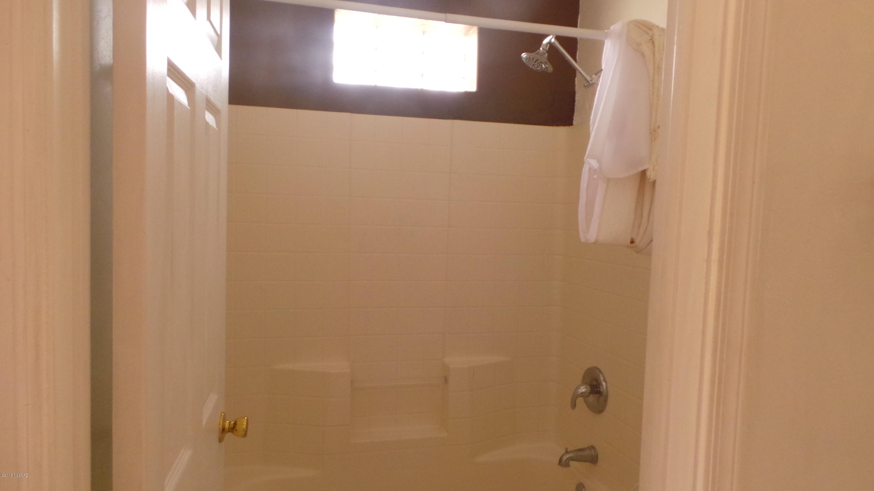 294 Placita Managua Rio Rico, AZ 85648 - Photo 16 of 33 a bathroom with a shower