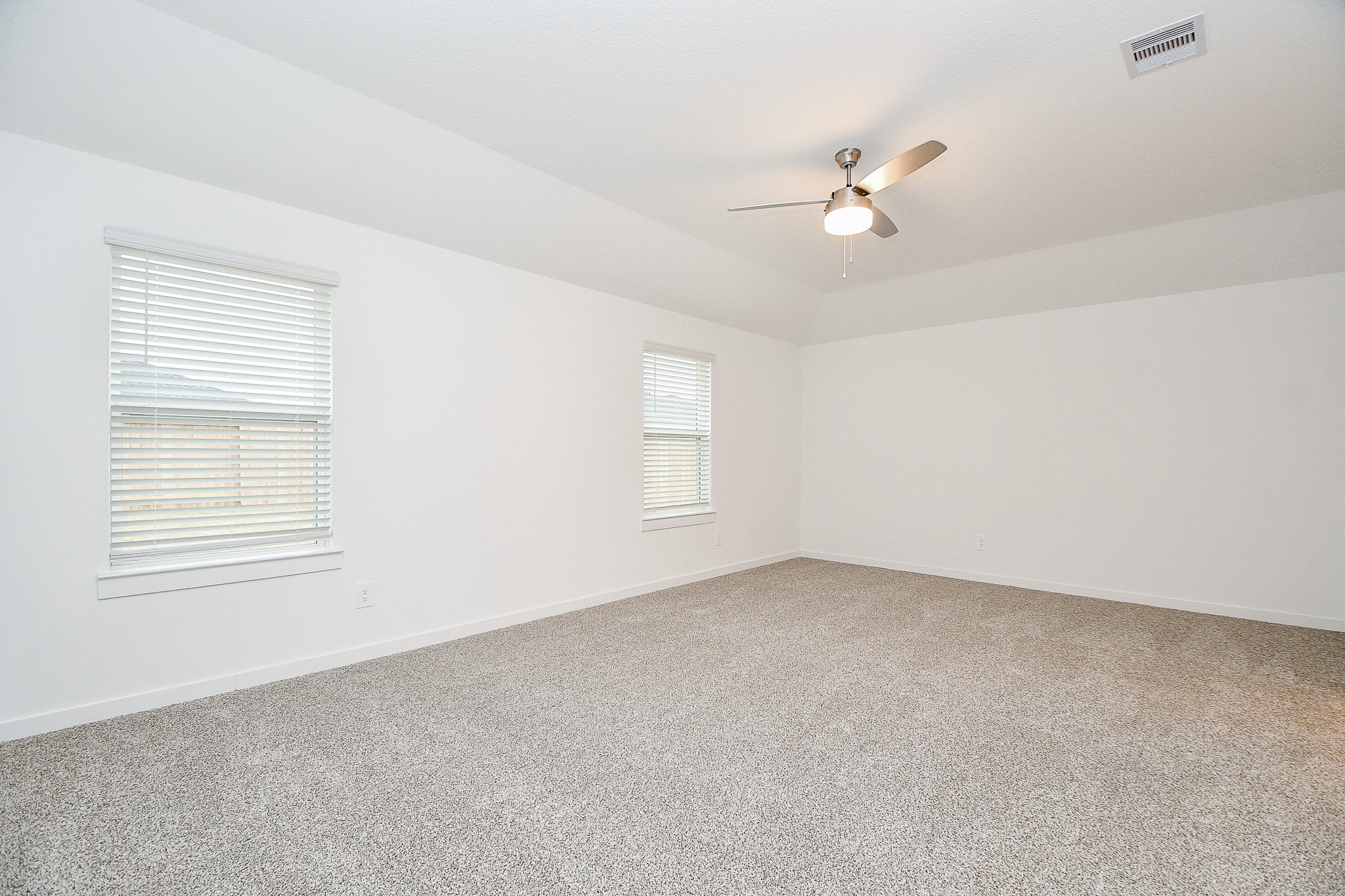31715 Hallington Hl Lane Fulshear, TX 77441 - Photo 13 of 37 an empty room with a window and ceiling fan