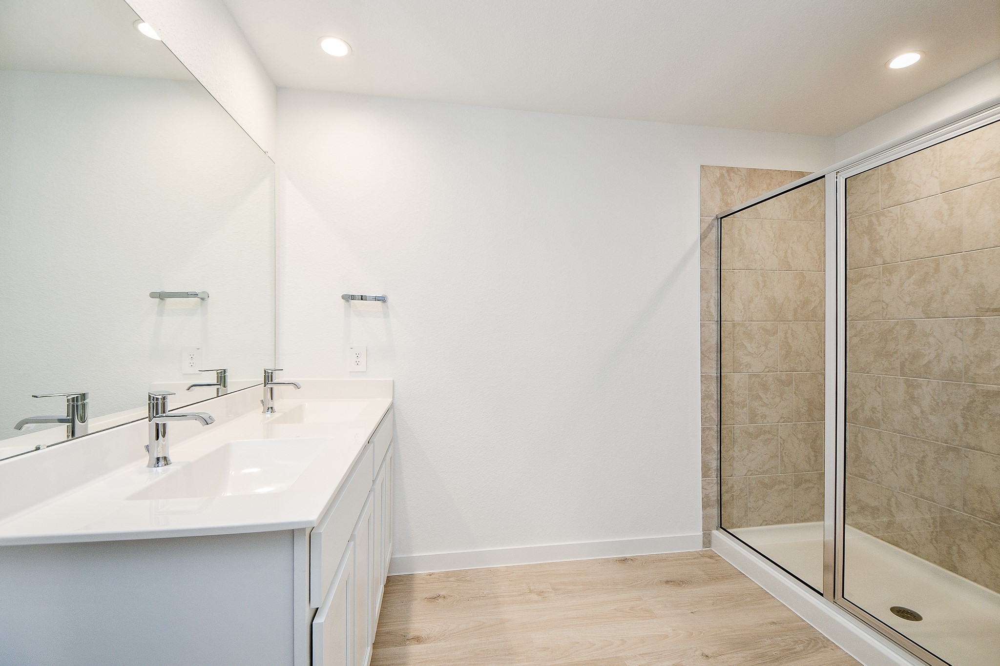 31715 Hallington Hl Lane Fulshear, TX 77441 - Photo 16 of 37 a bathroom with a sink and a mirror