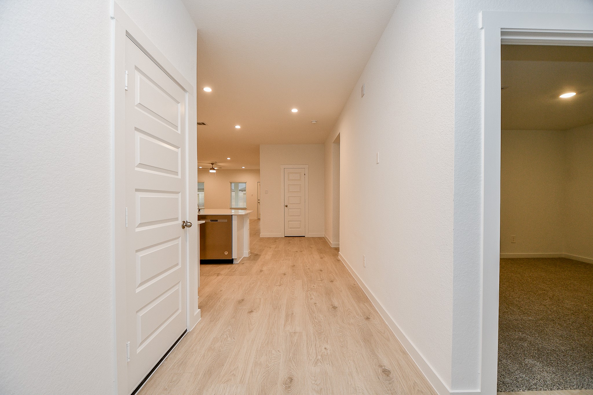 31715 Hallington Hl Lane Fulshear, TX 77441 - Photo 20 of 37 a view of a kitchen with a refrigerator
