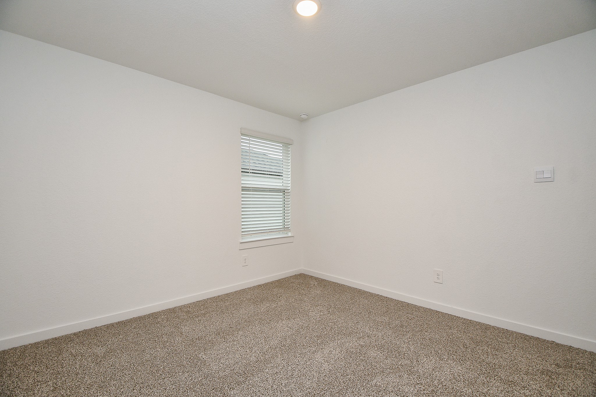 31715 Hallington Hl Lane Fulshear, TX 77441 - Photo 23 of 37 an empty room with a window