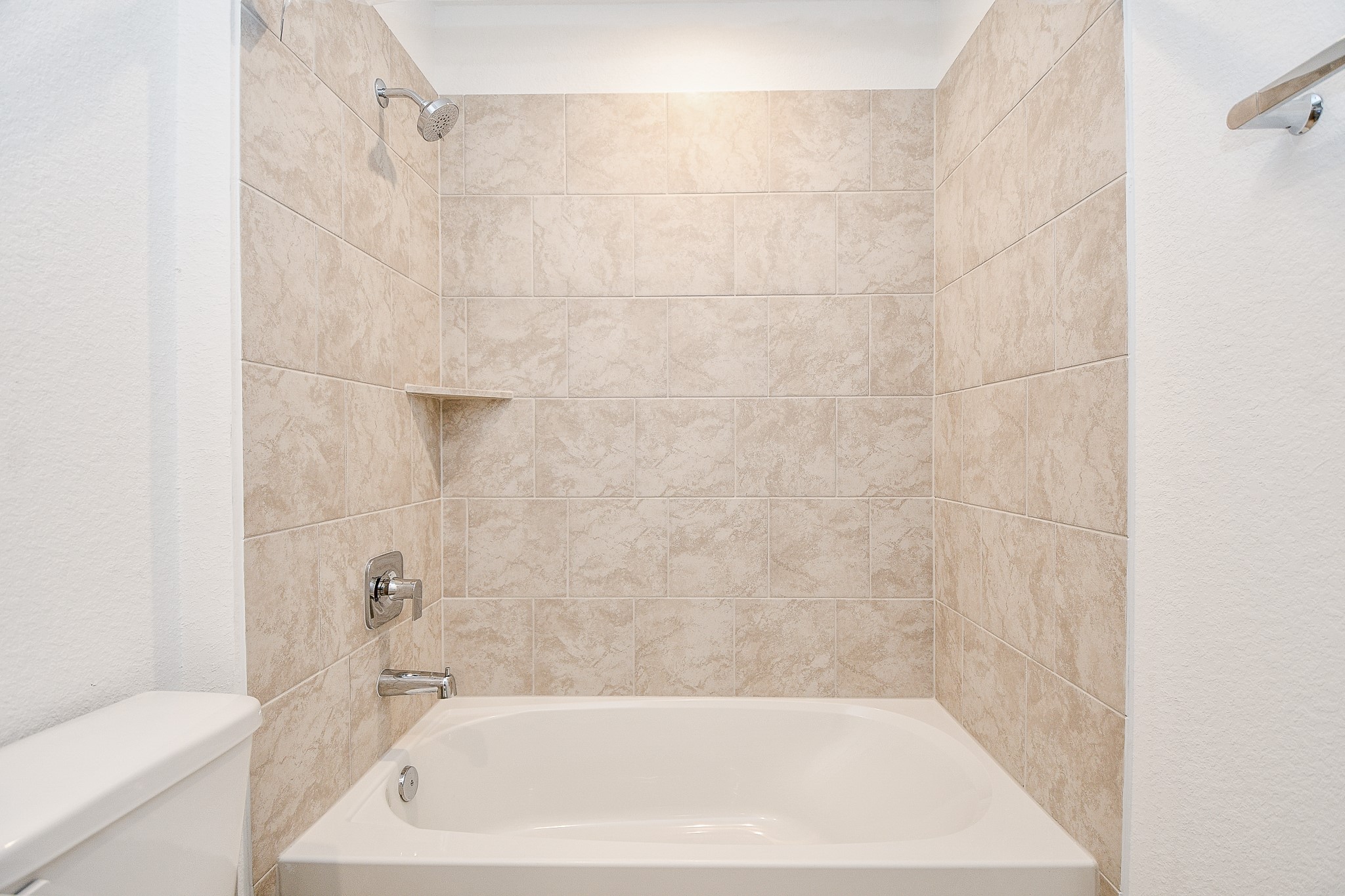 31715 Hallington Hl Lane Fulshear, TX 77441 - Photo 29 of 37 a bath tub sitting next to a white toilet and sink