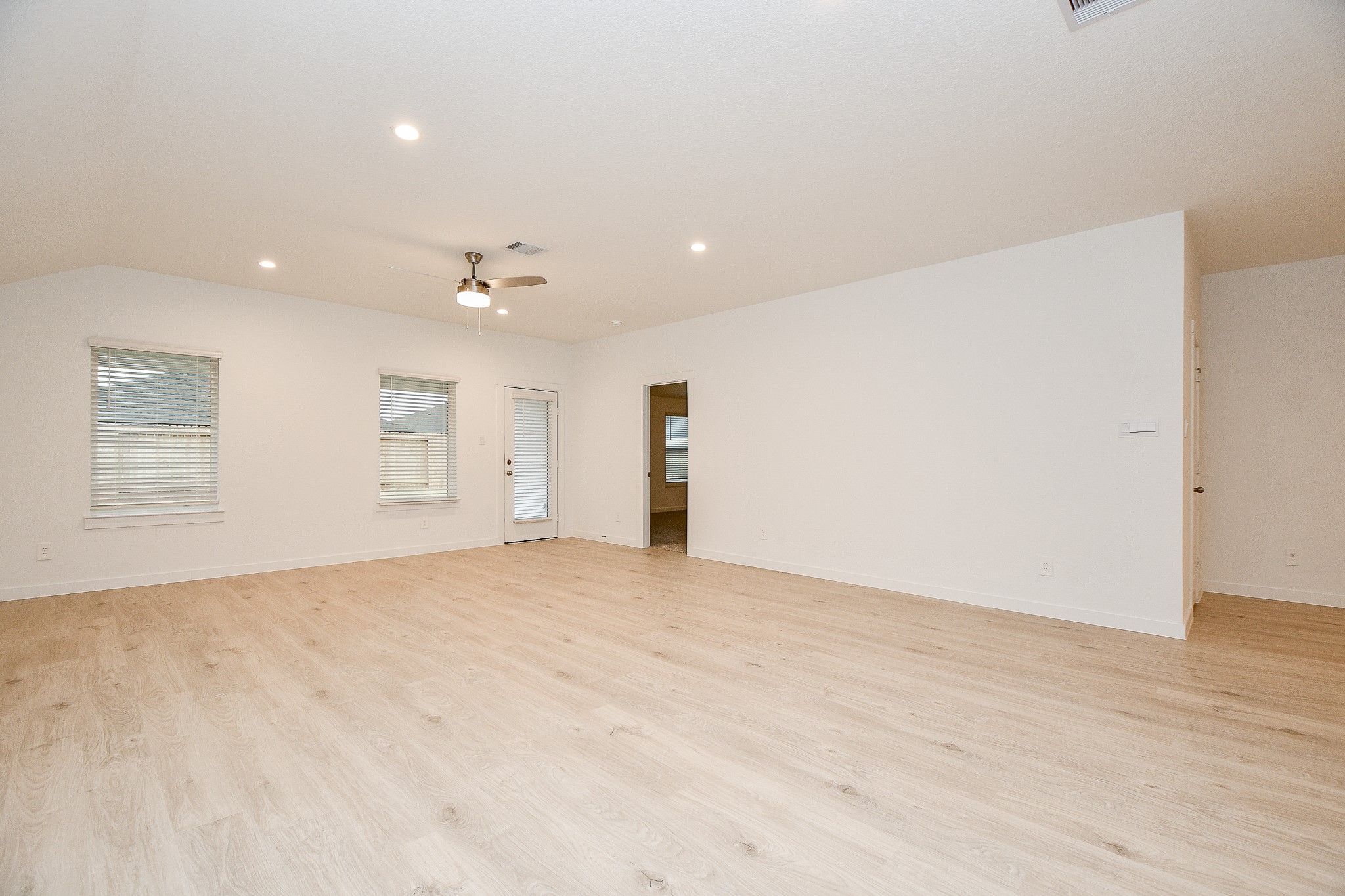 31715 Hallington Hl Lane Fulshear, TX 77441 - Photo 10 of 37 a view of an empty room with a window