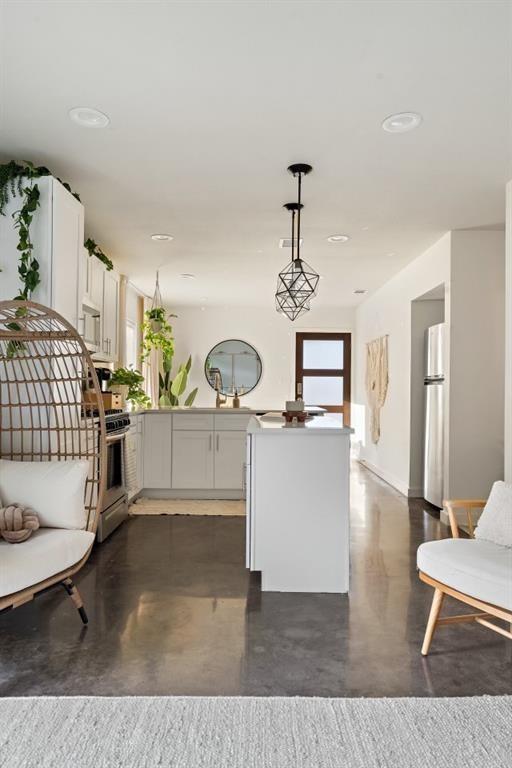 6003 Jain Lane, Unit A Austin, TX 78721 - Photo 7 of 15 a view of a livingroom with furniture and staircase