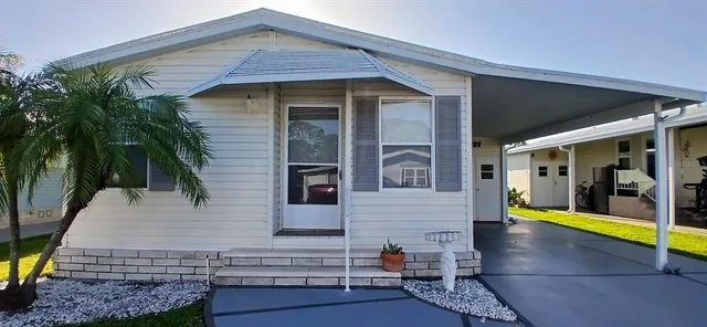 a view of the house with a patio