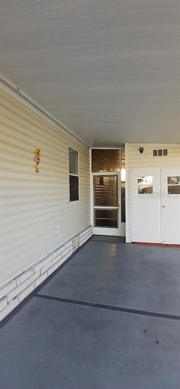 278 Pine Loop Frostproof, FL 33843 - Photo 9 of 40 a view of an empty room and window