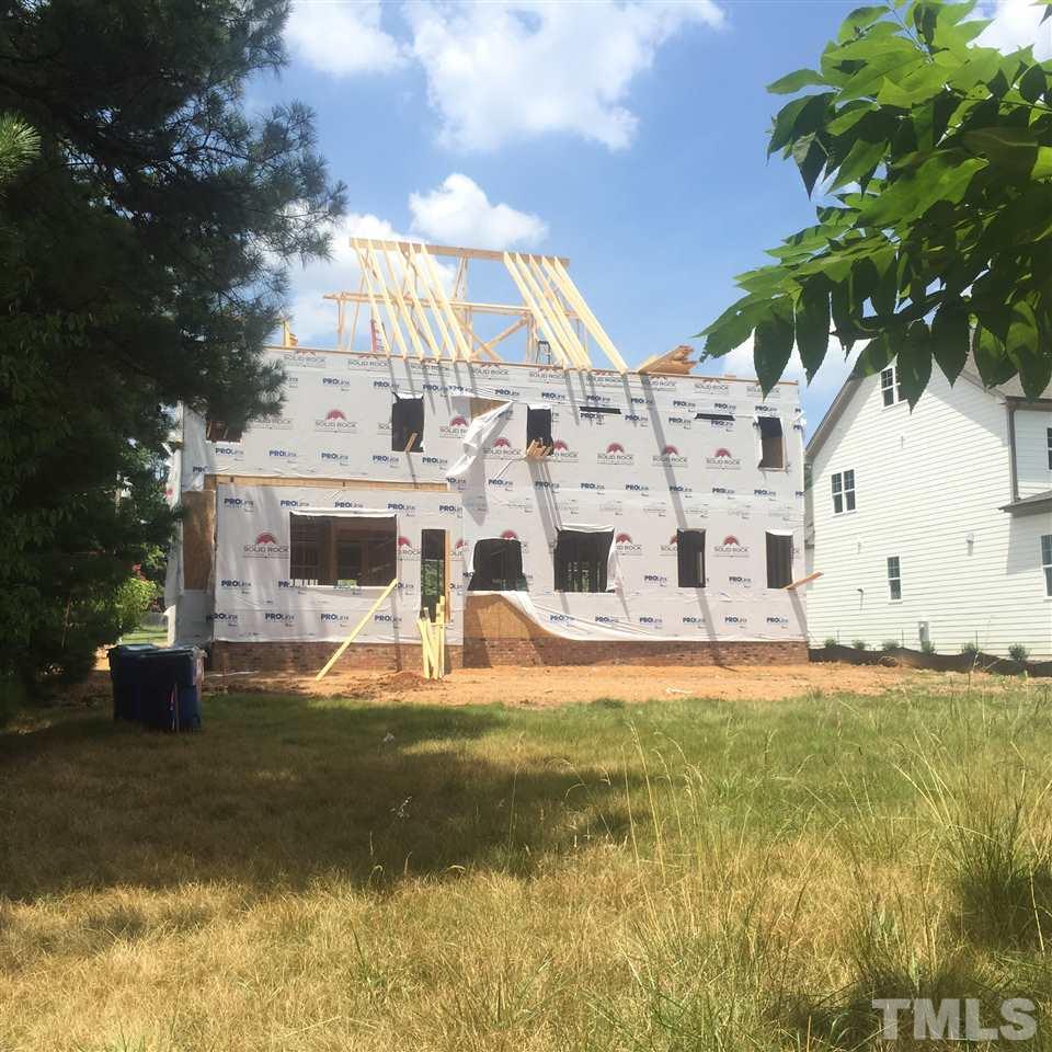 114 Reynolds Road Raleigh, NC 27609 - Photo 2 of 13 a view of a house with a yard