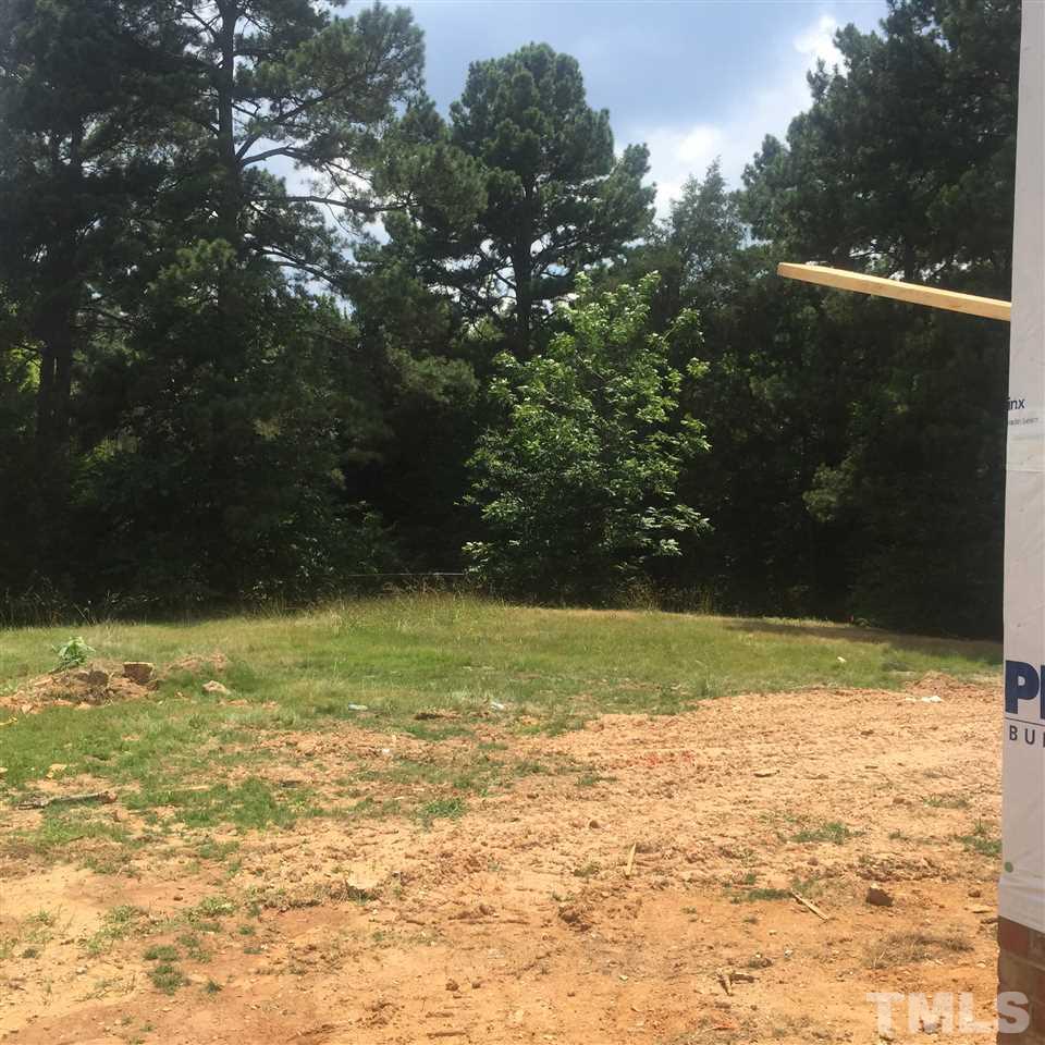 114 Reynolds Road Raleigh, NC 27609 - Photo 3 of 13 a view of a yard
