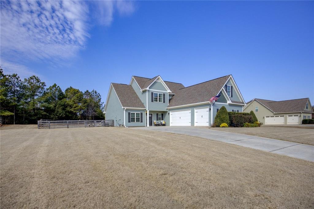 front view of a house with a yard