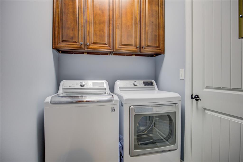 1021 Arbor Court Madison, GA 30650 - Photo 36 of 64 a utility room with dryer and washer