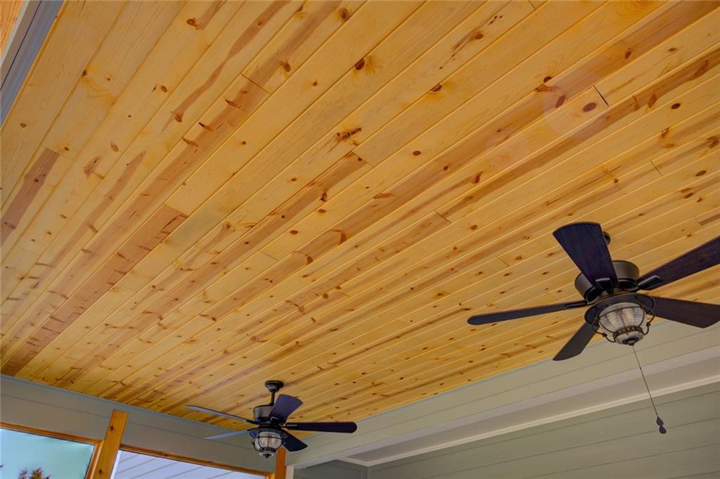 1021 Arbor Court Madison, GA 30650 - Photo 60 of 64 a room with a wooden wall