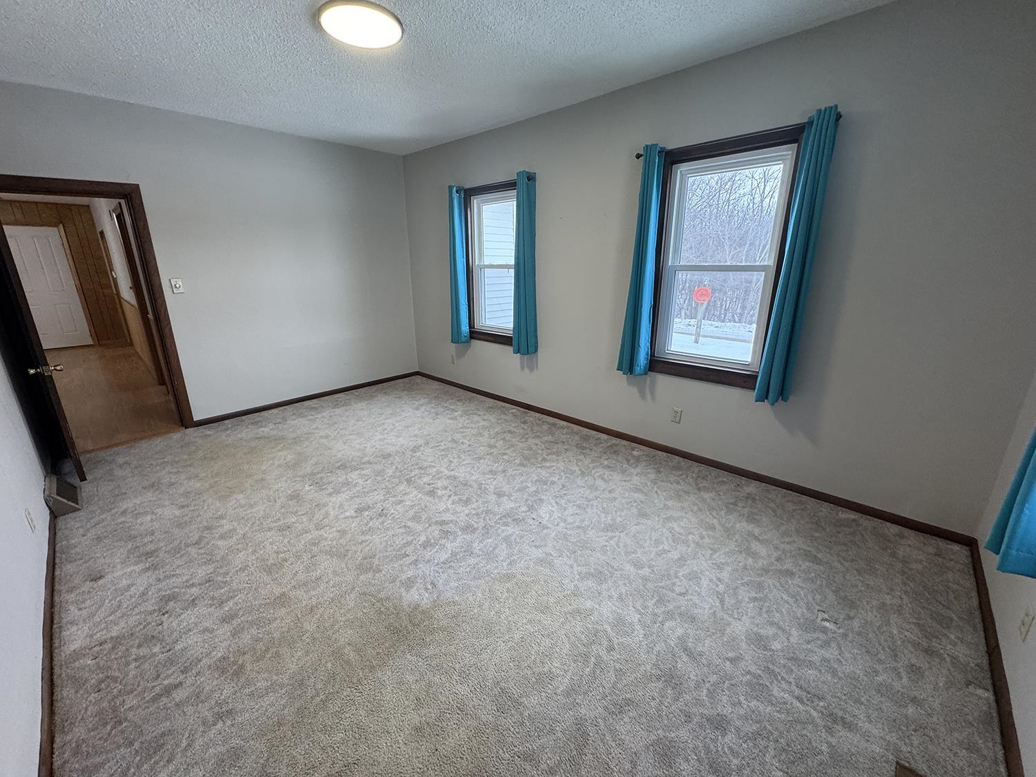18341 Pleasant Hill Road Mount Carroll, IL 61053 - Photo 11 of 41 an empty room with windows and closet