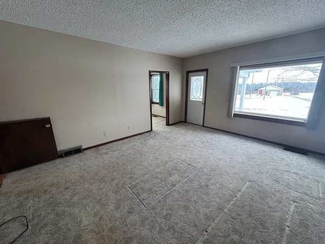 an empty room with windows