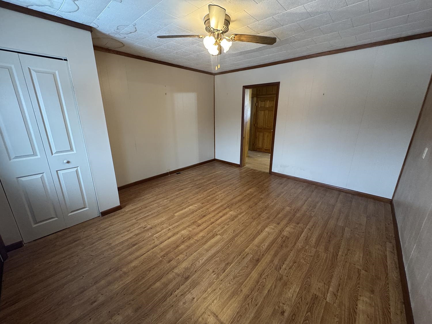 18341 Pleasant Hill Road Mount Carroll, IL 61053 - Photo 18 of 41 a view of an empty room with wooden floor